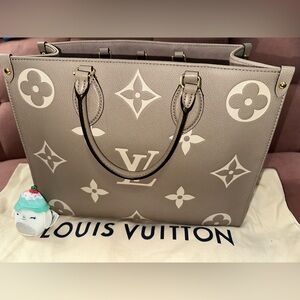 Louis Vuitton OnTheGo MM Bicolor Monogram Empreinte Leather Tourterelle Creme